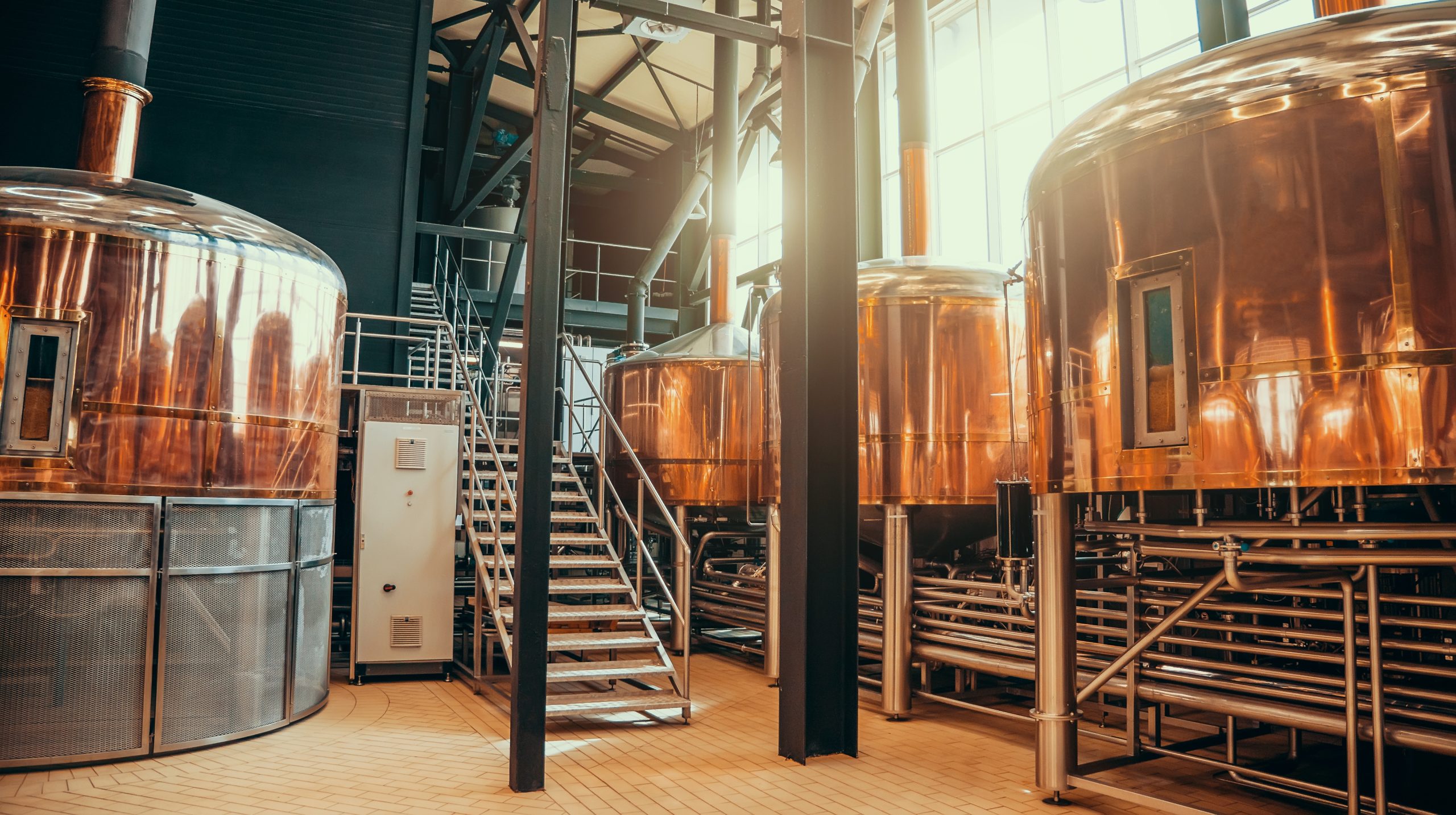 Large copper tanks in a distillery