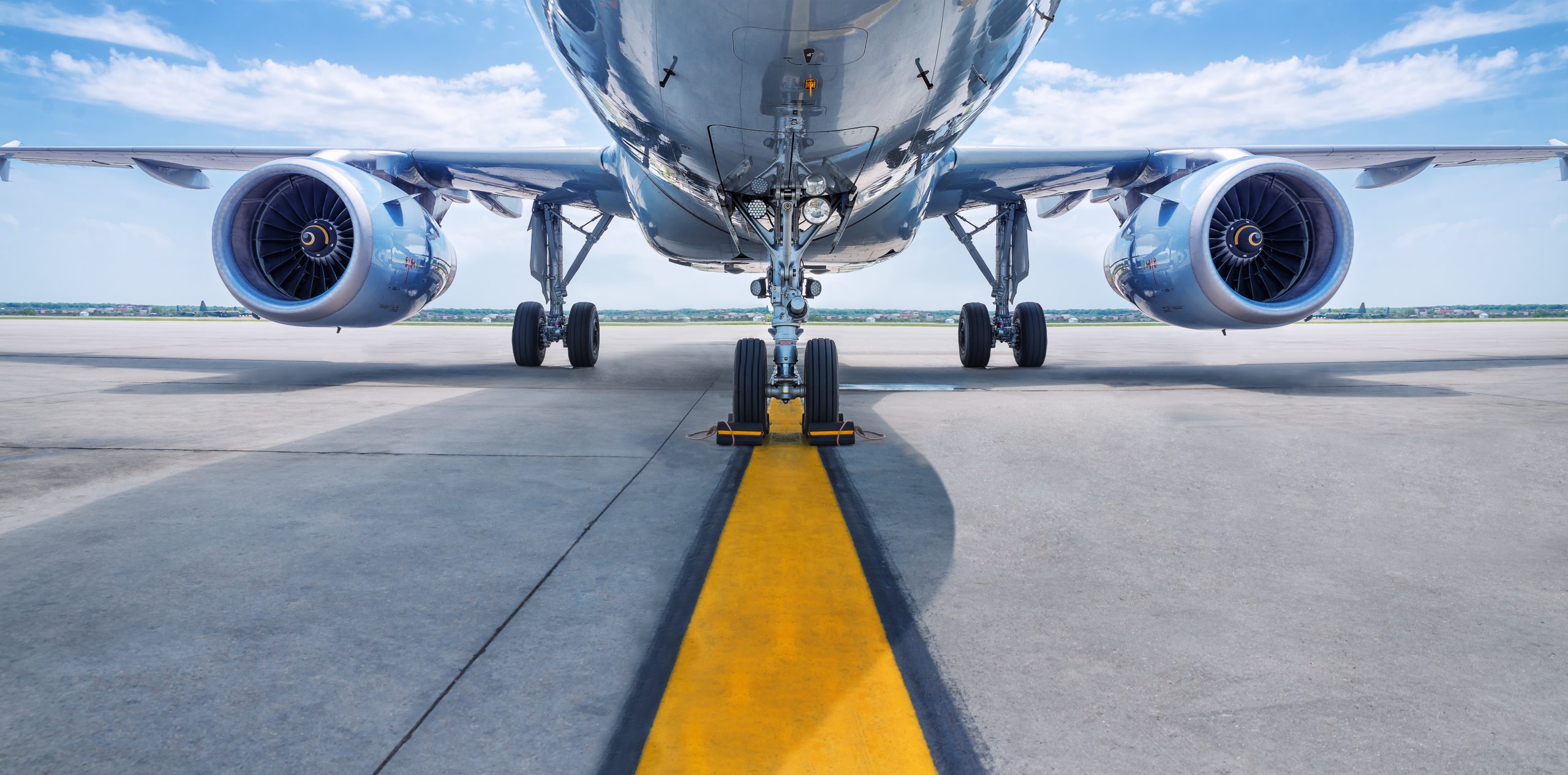 Underneath an aero plane at the runway 